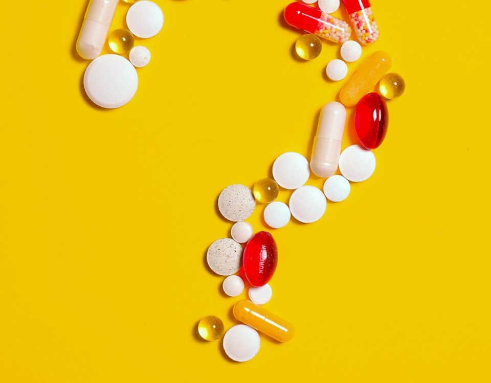 GLP-1 for professionals - doctor holding syringe representing Ozempic and tirzepatide medications